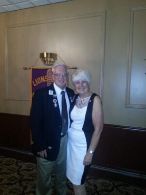 Receiving the Robert J. Uplinger Distinguished Service Award from past District Governor Lion Michael Lakowski